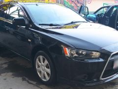 Фото авто Mitsubishi Lancer