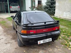 Сүрөт унаа Mazda 323