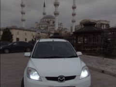 Фото авто Mazda Demio