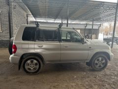 Сүрөт унаа Mitsubishi Pajero iO