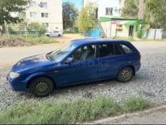 Сүрөт унаа Mazda 323