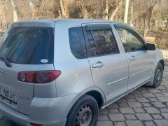 Фото авто Mazda Demio