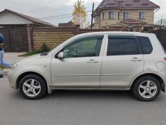 Фото авто Mazda Demio