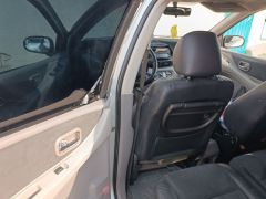 Фото авто Nissan Almera Tino