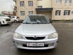 Фото авто Mazda 323