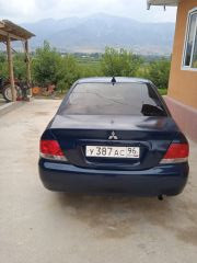 Сүрөт унаа Mitsubishi Lancer