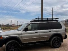 Сүрөт унаа Mitsubishi Montero Sport