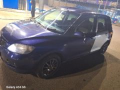 Сүрөт унаа Mazda Demio