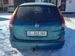 Фото авто Nissan Almera Tino