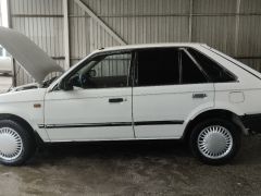 Photo of the vehicle Mazda 323