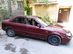 Фото авто Mazda 323