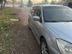 Фото авто Mitsubishi Lancer