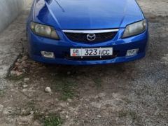 Сүрөт унаа Mazda 323