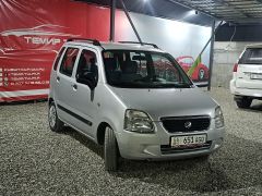 Photo of the vehicle Suzuki Wagon R+