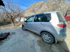 Photo of the vehicle Mazda Demio