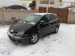 Фото авто Nissan Almera Tino