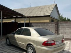 Фото авто Mazda 626