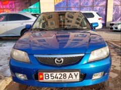 Фото авто Mazda 323