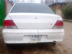 Фото авто Mitsubishi Lancer