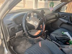 Сүрөт унаа Mazda 323