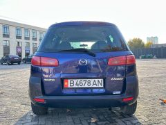 Сүрөт унаа Mazda Demio