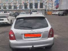 Сүрөт унаа Mazda 323