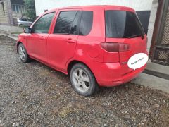 Photo of the vehicle Mazda Demio