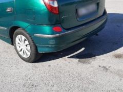 Photo of the vehicle Nissan Almera Tino