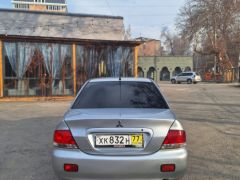 Фото авто Mitsubishi Lancer