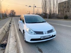 Фото авто Nissan Tiida