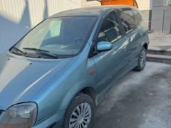 Фото авто Nissan Almera Tino