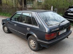 Фото авто Mazda 323