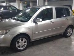 Photo of the vehicle Mazda Demio