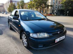 Фото авто Mazda 323