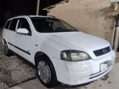 Фото авто Opel Astra