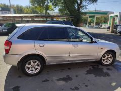 Фото авто Mazda 323