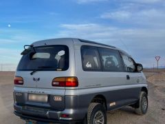 Сүрөт унаа Mitsubishi Delica