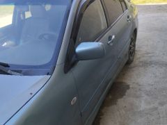 Photo of the vehicle Mitsubishi Lancer