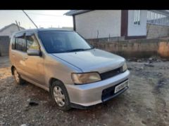 Photo of the vehicle Nissan Cube