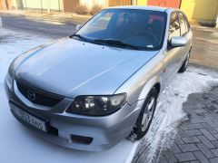 Сүрөт унаа Mazda 323