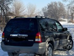 Photo of the vehicle Mazda Tribute