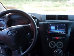 Фото авто Daihatsu Cuore