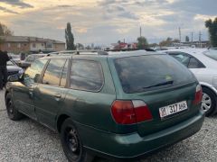 Фото авто Nissan Primera