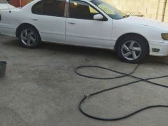 Photo of the vehicle Nissan Cefiro