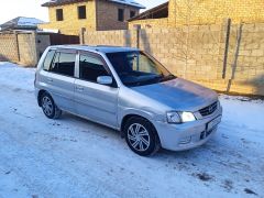 Photo of the vehicle Mazda Demio