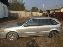 Photo of the vehicle Mazda 323