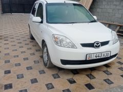 Фото авто Mazda Demio