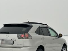 Photo of the vehicle Lexus RX