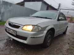 Фото авто Mazda Familia