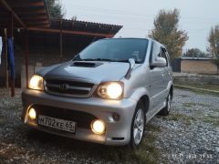 Сүрөт унаа Toyota Cami